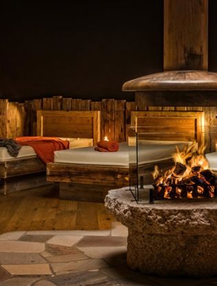 After the sauna you can unwind in the relaxation nests of our well-being hotel in Toblach
