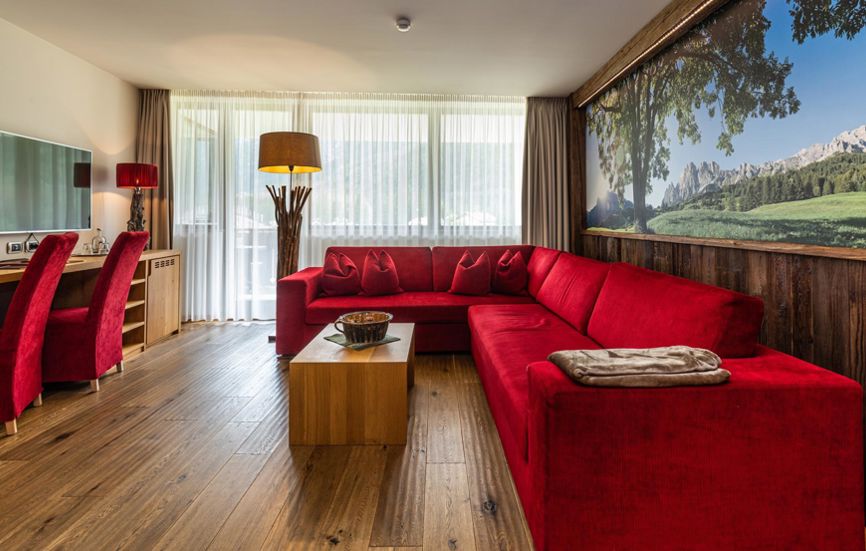 Wohnzimmer mit Balkon - Suite Lodge Saskia